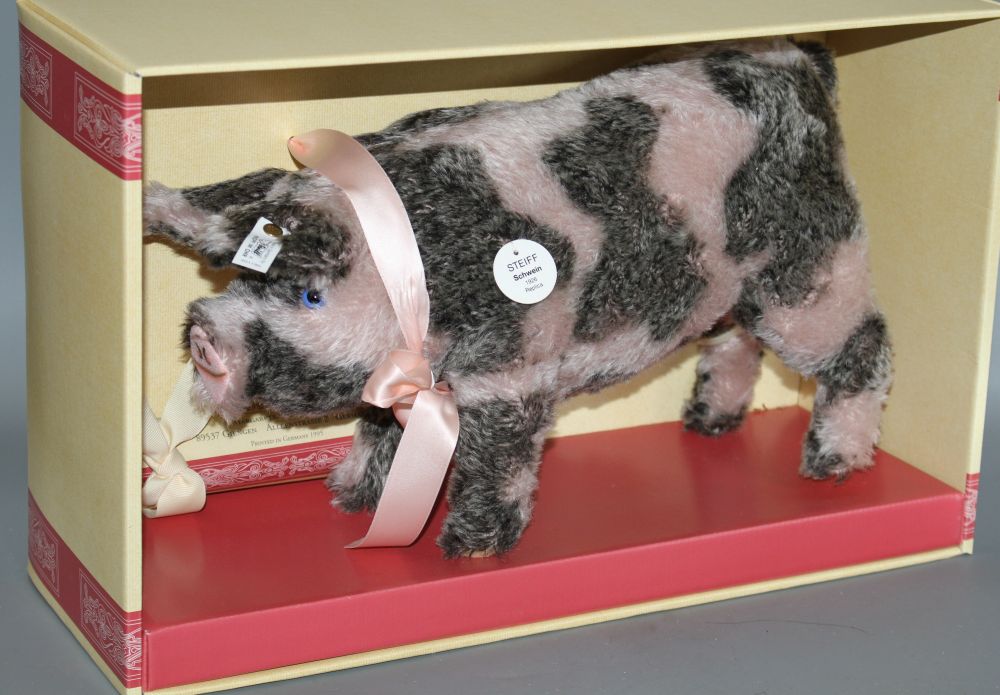 A group of assorted soft toy pigs including Steiff